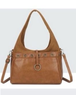 Bolso con tachuelas y asa en ante
