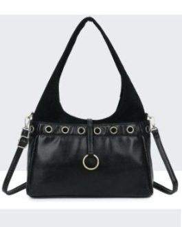Bolso con tachuelas y asa en ante